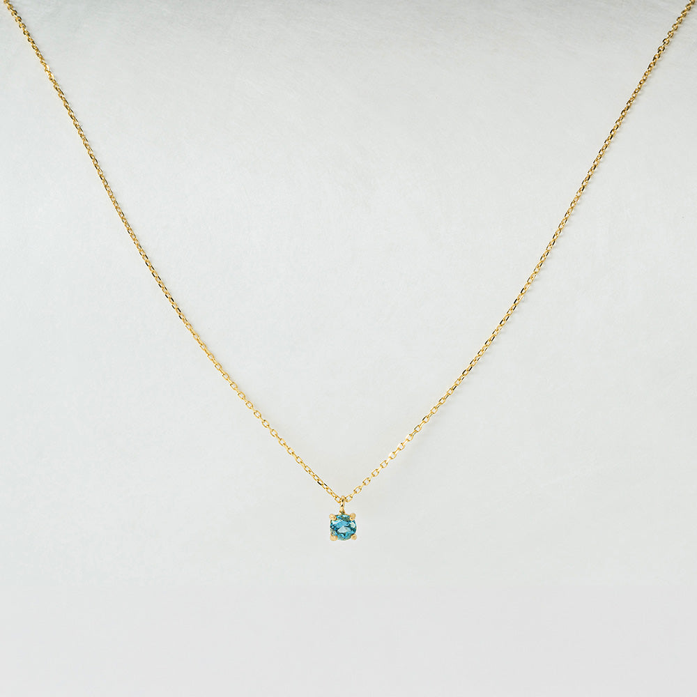 Kette aus 18K Gold mit hellblauem Topas