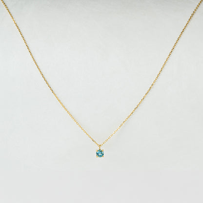 Kette aus 18K Gold mit hellblauem Topas