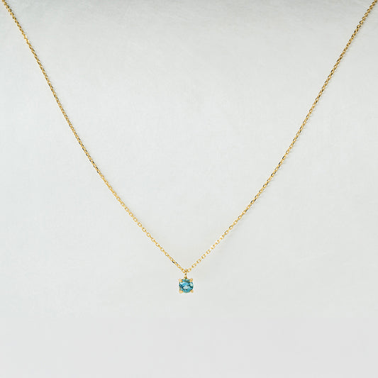 Kette aus 18K Gold mit hellblauem Topas